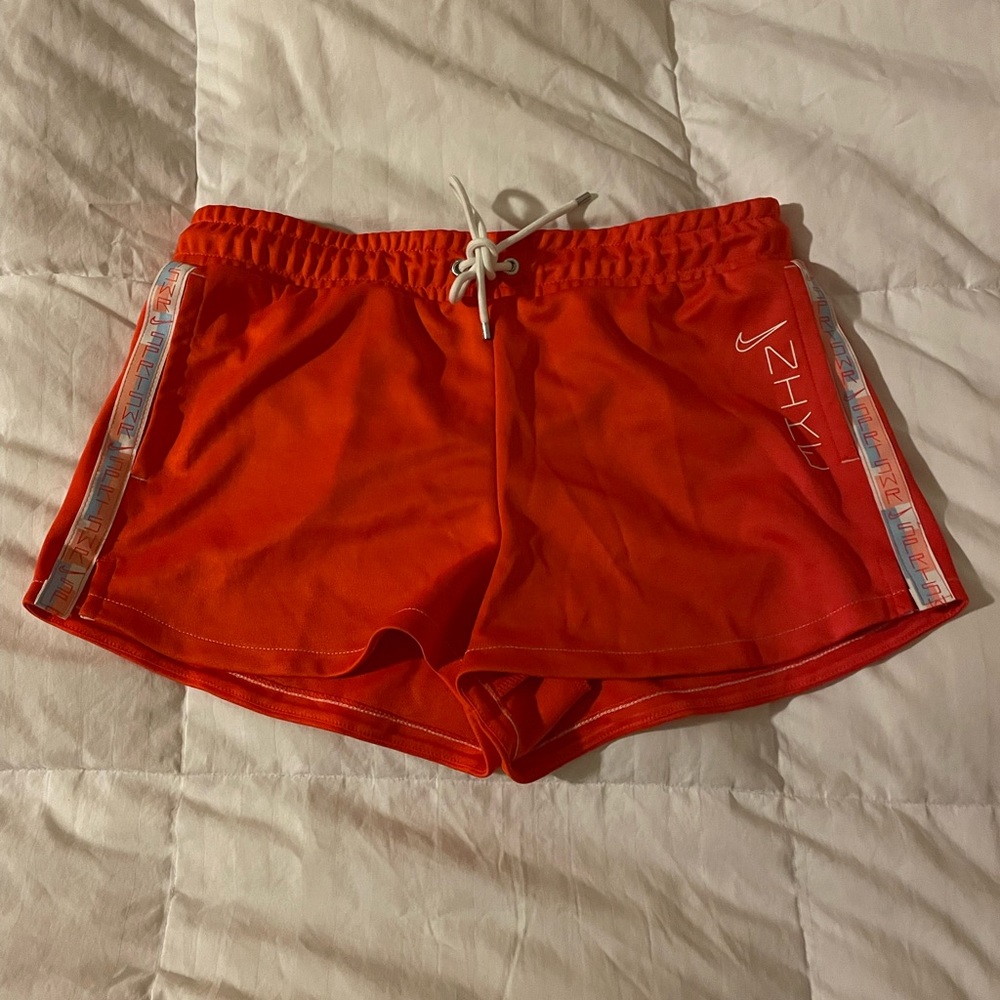 Orange Nike shorts